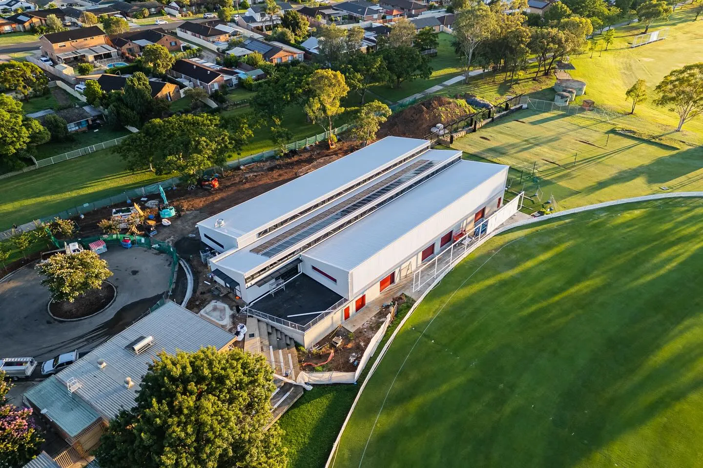 Aerial view of the completed sports facility and surrounding grounds